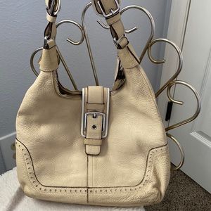 Used authentic Coach shoulder bag, light cream color. Great condition